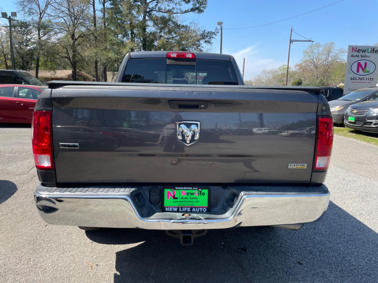 2017 GRAY RAM 1500 SLT (1C6RR6GG5HS) with an 3.6L engine, Automatic transmission, located at 5103 Dorchester Rd., Charleston, SC, 29418-5607, (843) 767-1122, 36.245171, -115.228050 - Spacious interior with AUX/Bluetooth/Sat/AM/FM, Power Everything (windows, locks, seat, mirrors), Power Sliding Rear Window, 150W Power Inverter, Keyless Entry, Running Boards, Bed Cover, Tow Package, Alloy Wheels. 140k miles Located at New Life Auto Sales! 2023 WINNER for Post & Courier's Charlest - Photo#5